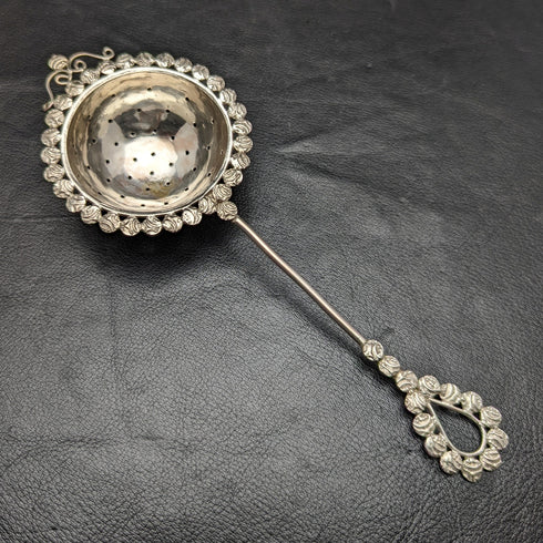Vintage silver-plated tea strainer
